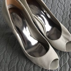 Gray suede Coach peep toe heels.